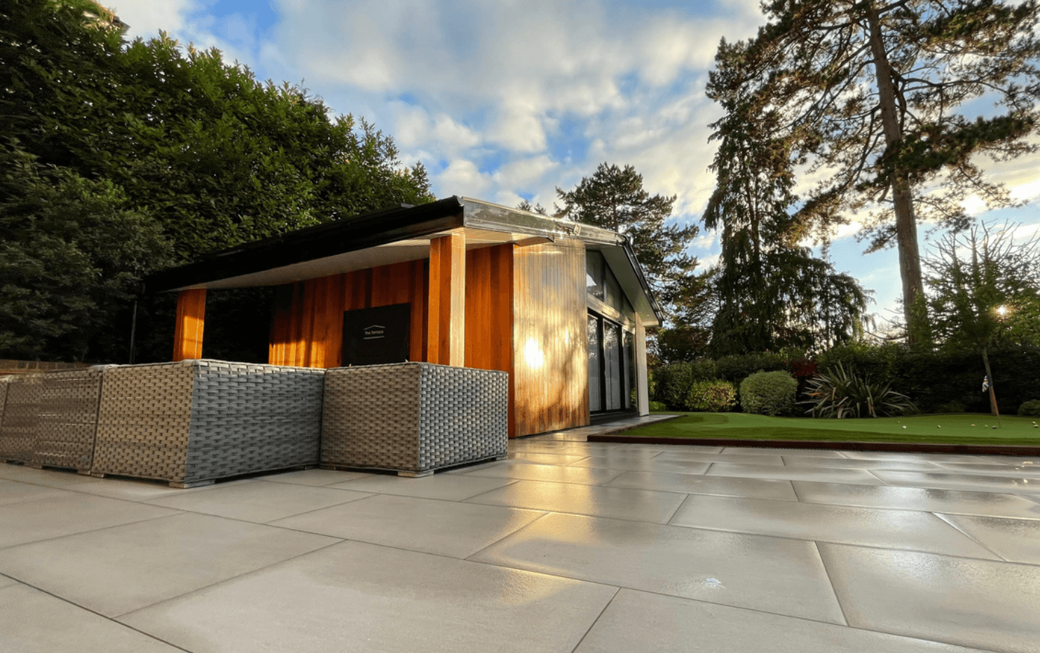 outside of golf sim log cabin