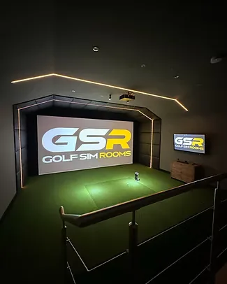 Simulator bay with the GSR logo on the screen, LED edging and a glass balustrade in the foreground