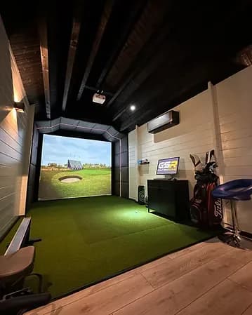 inside a home golf simulator