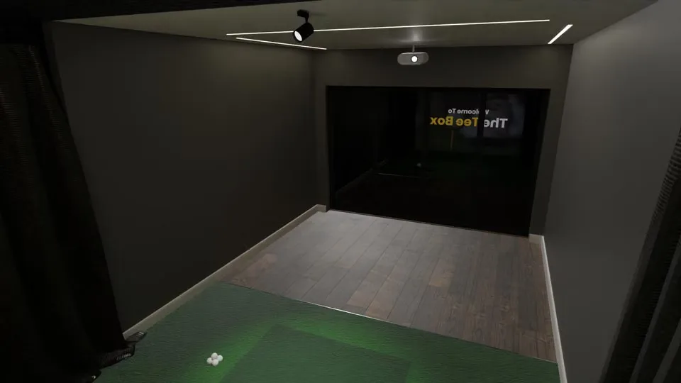 Inside The Tee Box looking back towards the glass doors, the projector on the ceiling