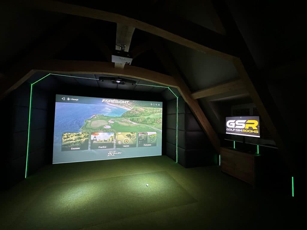 Simulator screen showing a course menu, with green LED edging and a GSR sign on a cabinet beside it