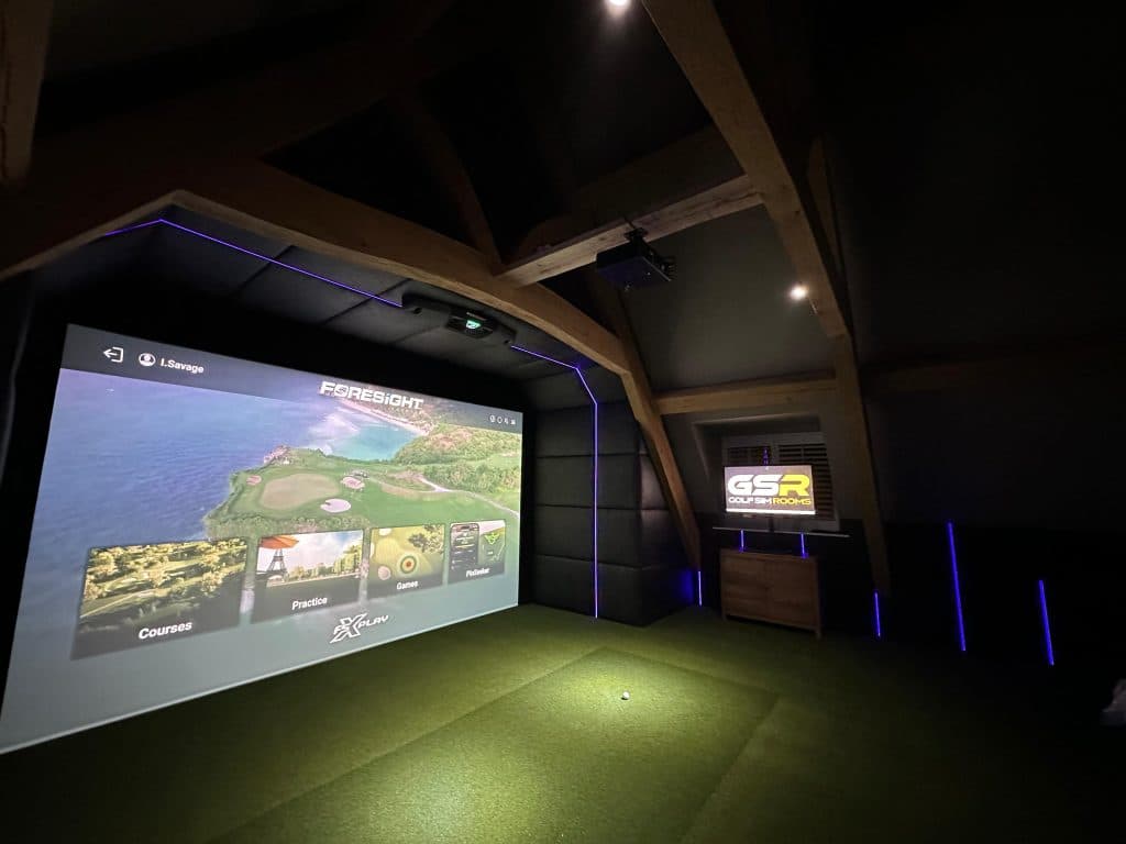 Course menu on the simulator screen, with blue LED edging and a GSR sign on the cabinet to the right